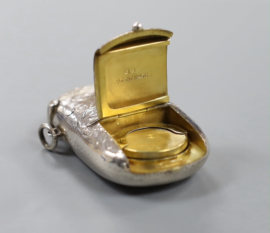 A late Victorian engraved silver combination sovereign, vesta and stamp case, the interior with removable toothpick and pencil, William Neale Ltd, Birmingham, 1897, 63mm.